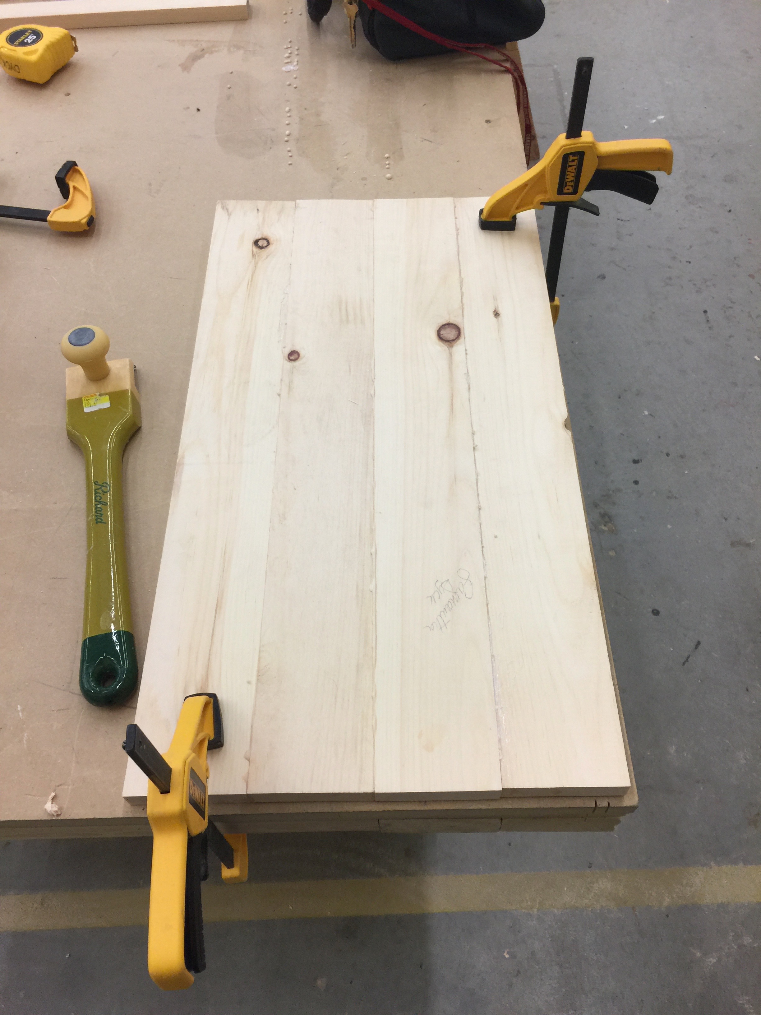 Wood clamped down